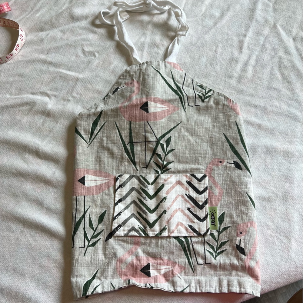 Flamingo gray and pink reversible girls pocketed apron.